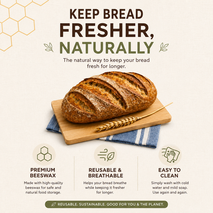 Beeswax bread bag keeping a sourdough loaf fresh on a wooden board